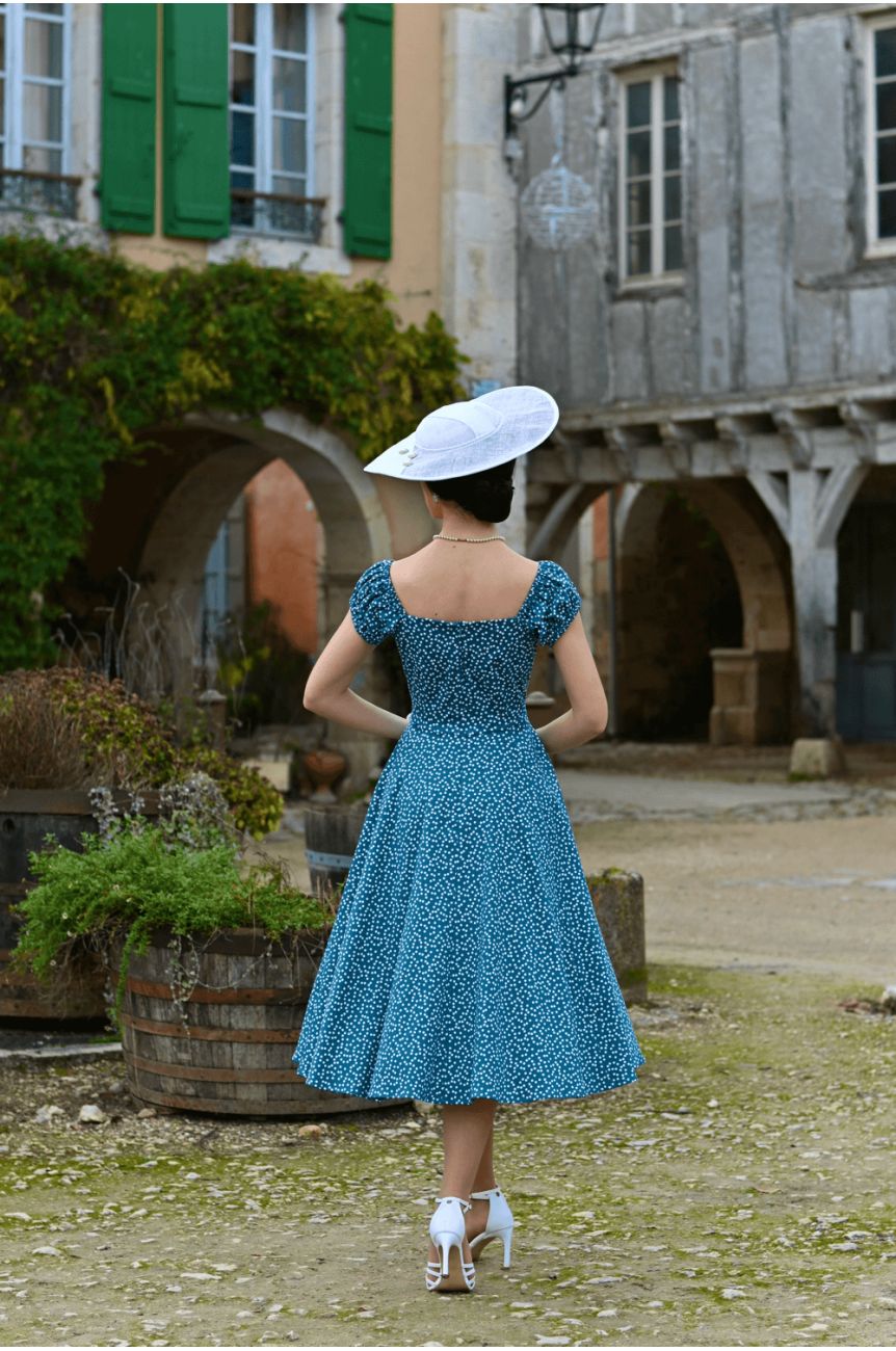 Dos robe swing turquoise polka dot encolure carree jupe evasee vintage